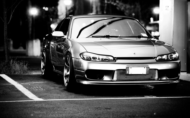 silver sports car at night