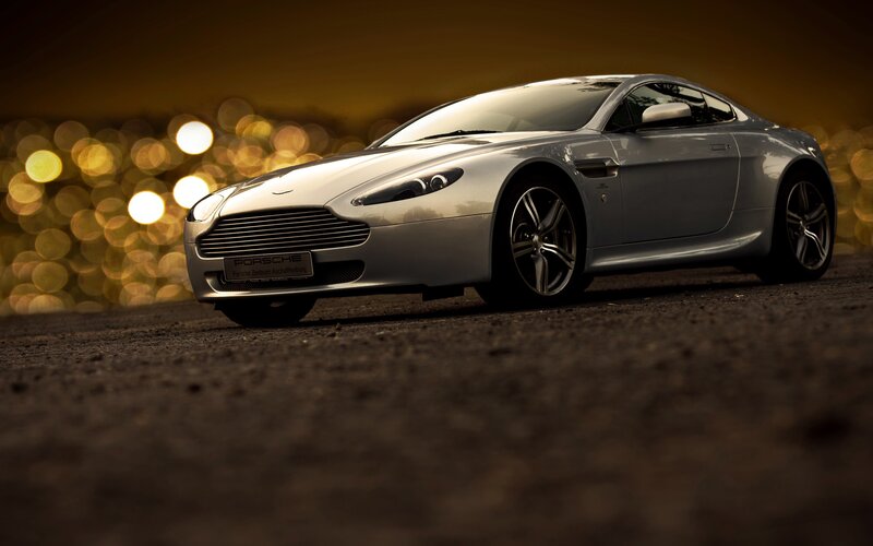 silver sports car at night