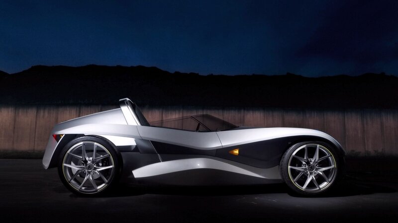 silver sports car at night