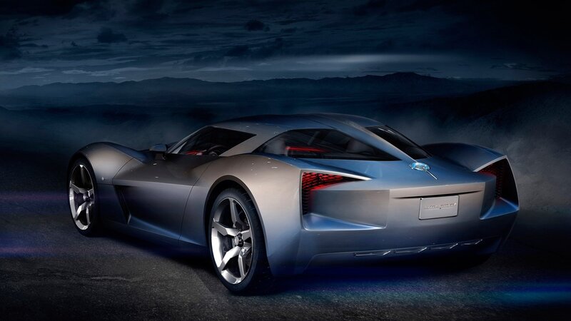 Silver sports car at night