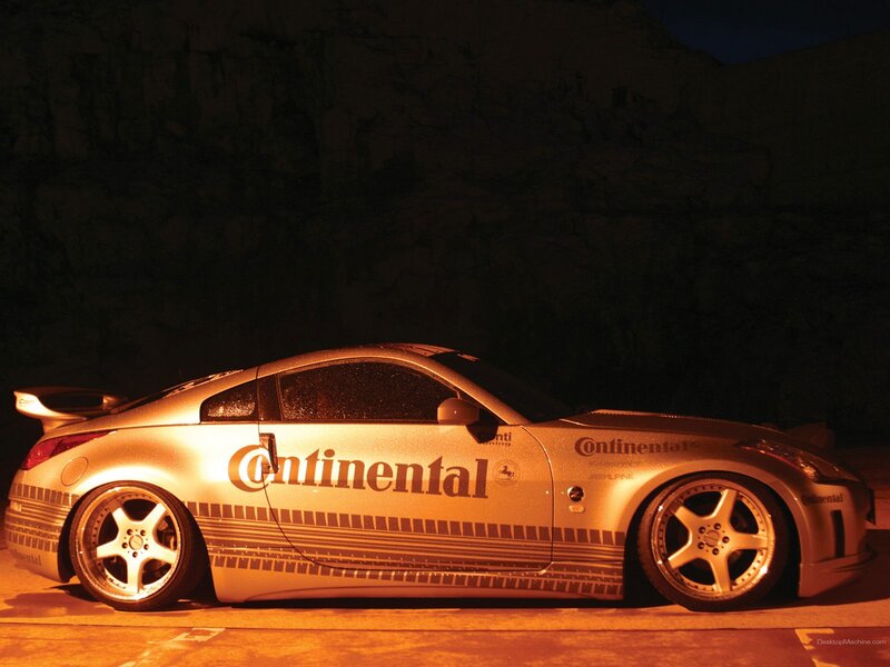 silver sports car at night