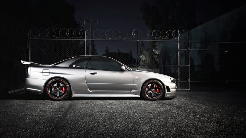 silver sports car at night