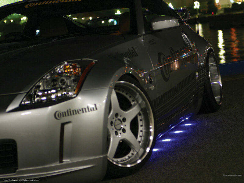 silver sports car at night