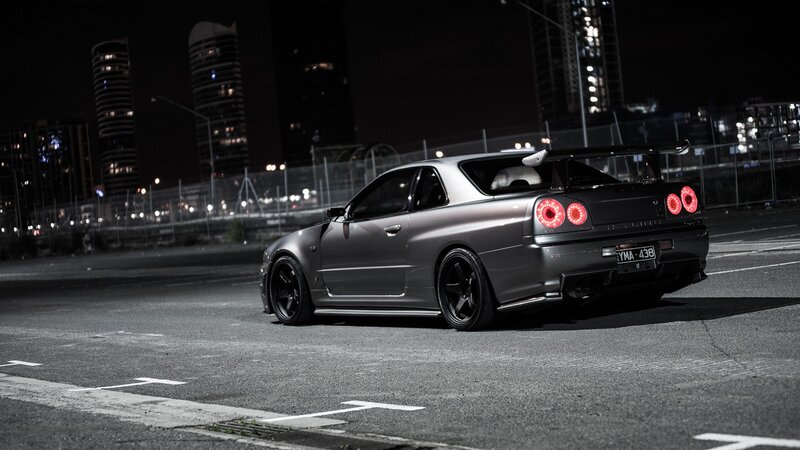 silver sports car at night