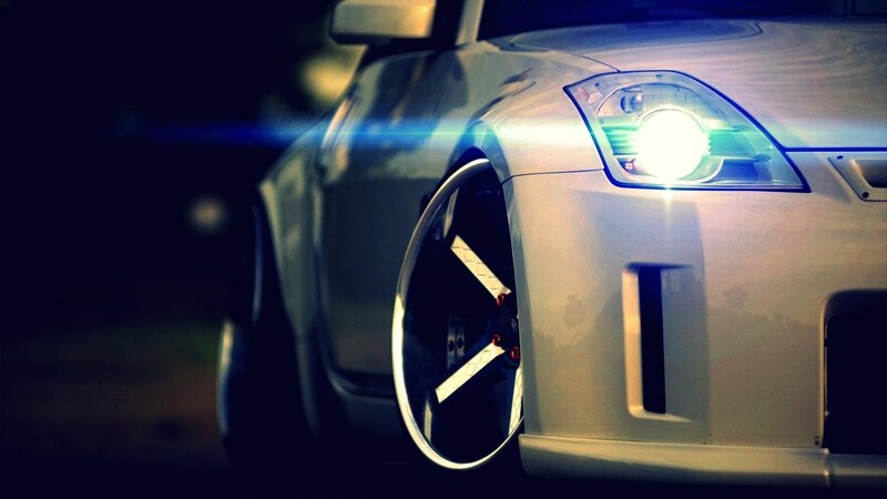 silver sports car at night