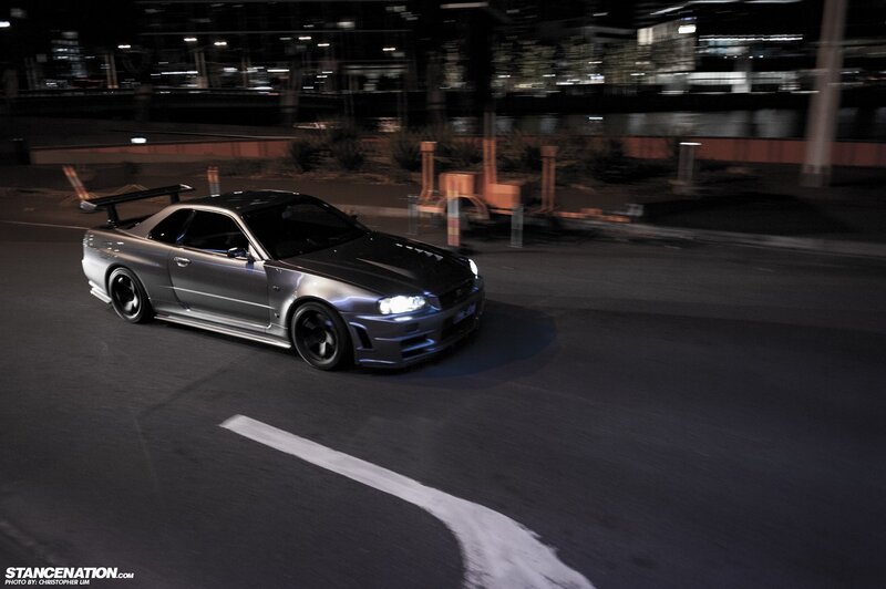 silver sports car at night
