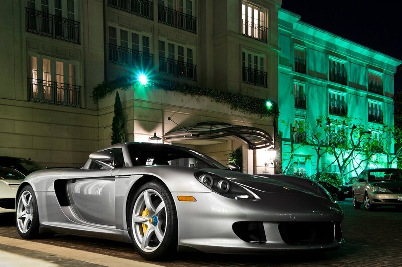 Silver sports car at night