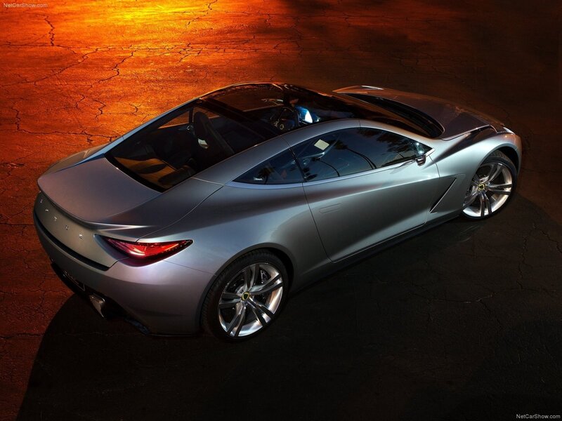 Silver sports car at night