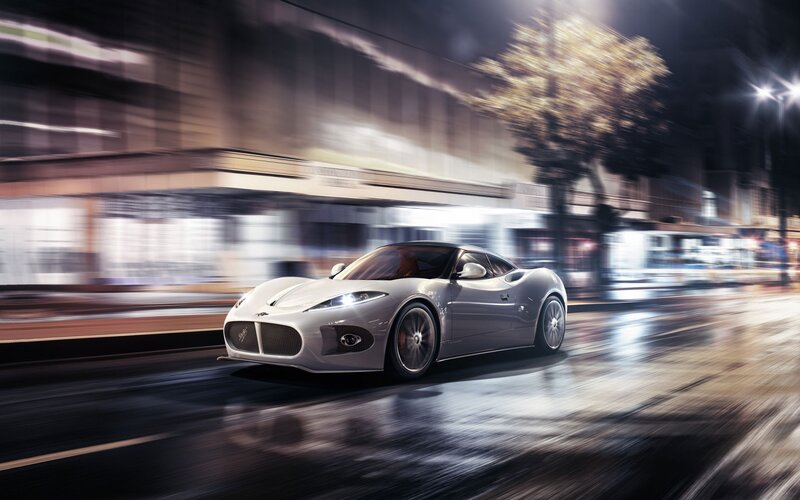silver sports car at night