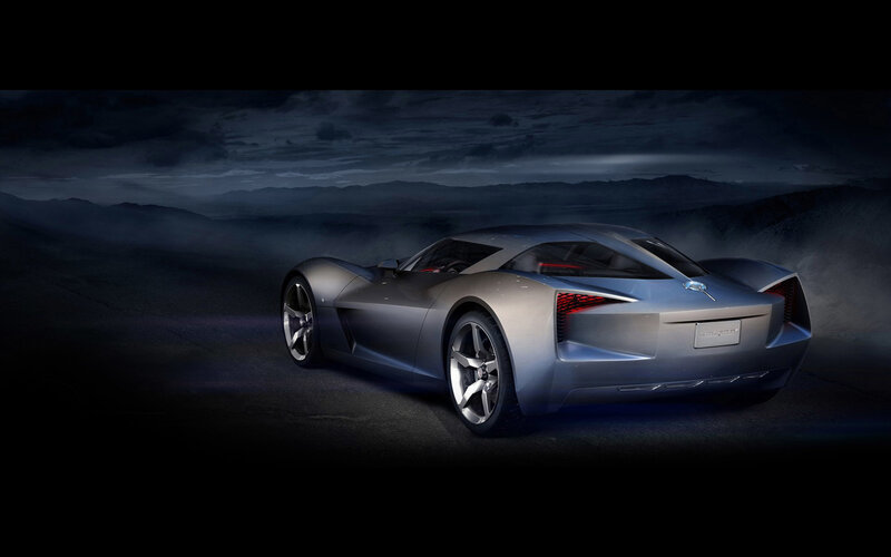 Silver sports car at night
