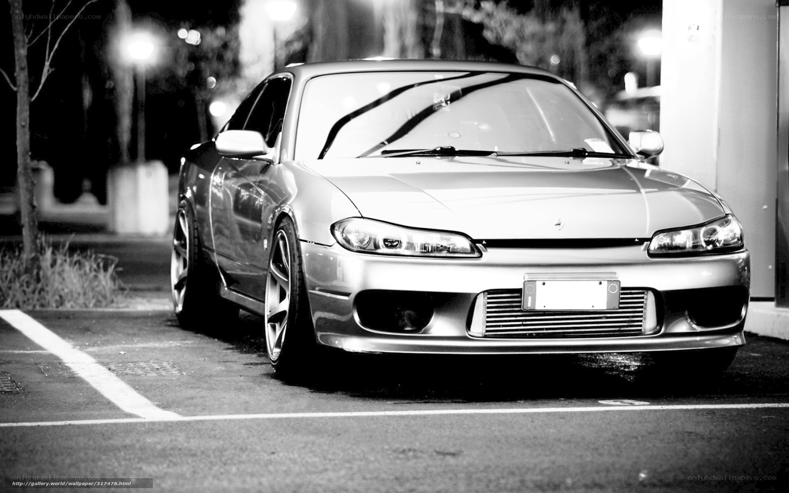 silver sports car at night