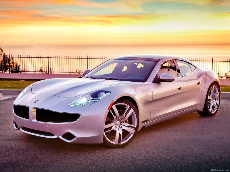 silver sports car at sunset
