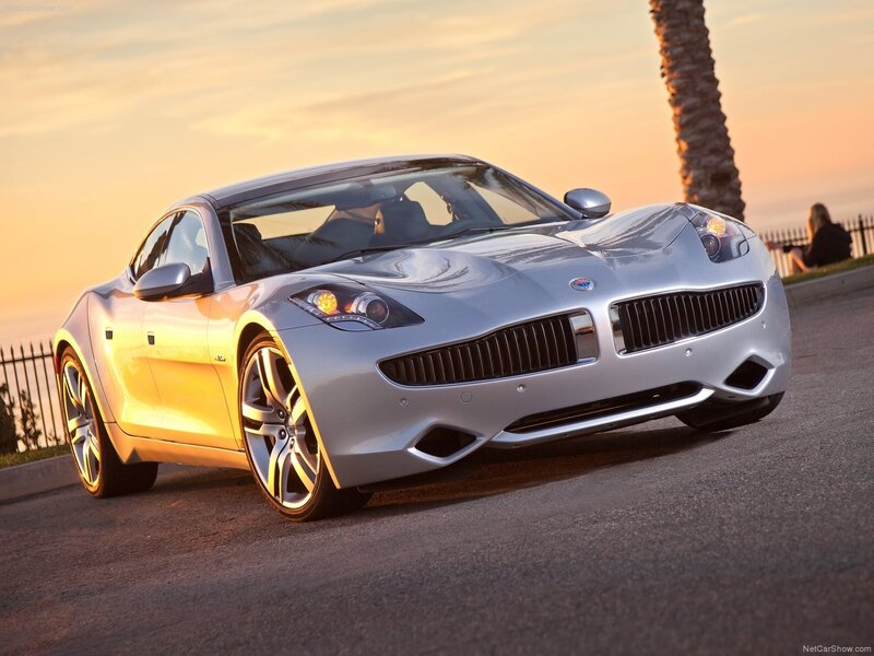 silver sports car at sunset