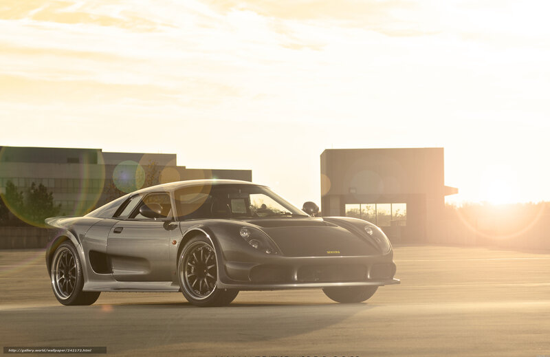 silver sports car at sunset