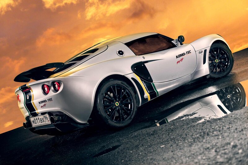 silver sports car at sunset