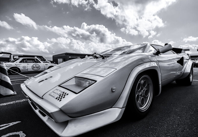 Silver Sports Car — Black, Dramatic, Afternoon