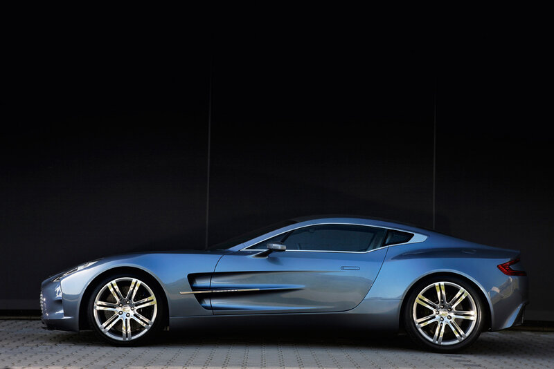 Silver Sports Car — Blue, Dramatic, Photograph, Wheels