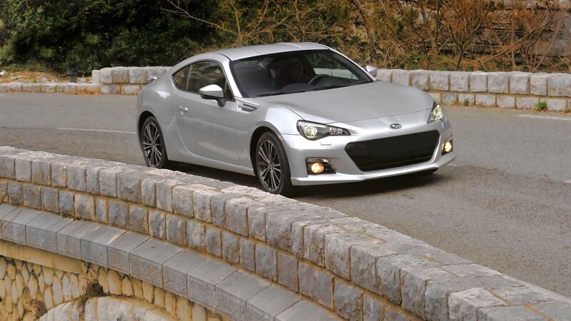 Silver Sports Car — Calm, Afternoon, Photograph, Stone Wall