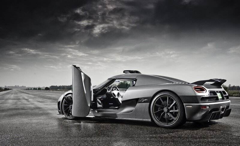Silver Sports Car — Cloudy Sky