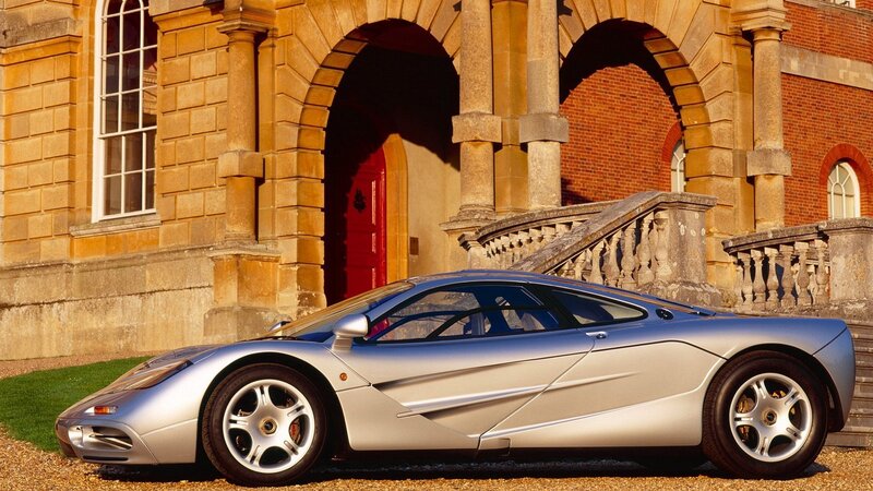 Silver Sports Car — Dramatic, Afternoon, Photograph, Building, Red Door