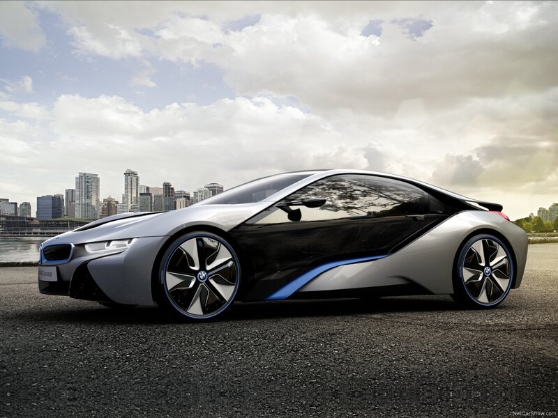 Silver Sports Car — Dramatic, Afternoon, Photograph, City Skyline, River