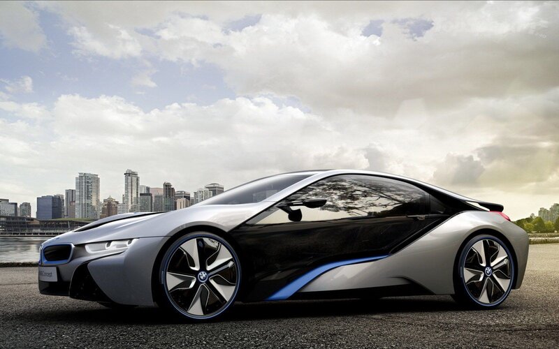 Silver Sports Car — Dramatic, Afternoon, Photograph, City Skyline