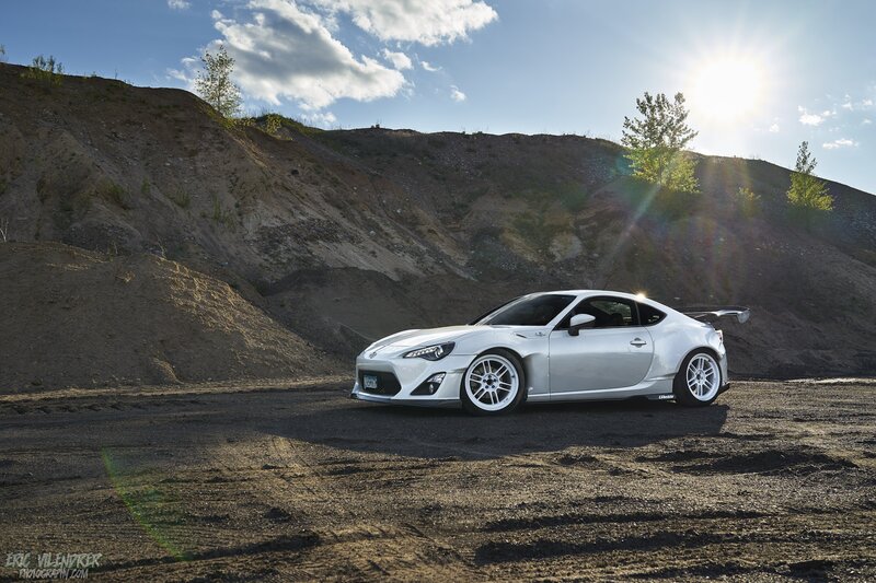 Silver Sports Car — Dramatic, Afternoon, Photograph, Dirt Field