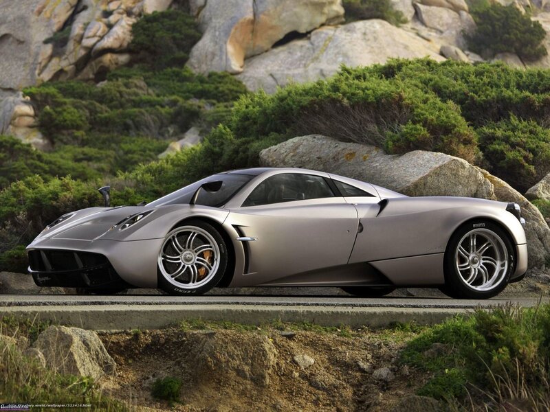 Silver Sports Car — Dramatic, Afternoon, Photograph, Road, Rocks, Shrubbery