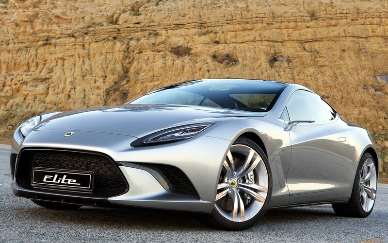 Silver Sports Car — Dramatic, Afternoon, Photograph, Rock Wall, Asphalt, Black