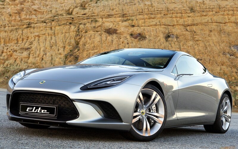Silver Sports Car — Dramatic, Afternoon, Photograph, Rock Wall, Asphalt