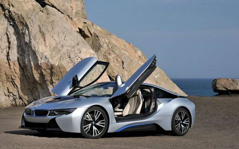 Silver Sports Car — Dramatic, Afternoon, Photograph, Rocky Cliff