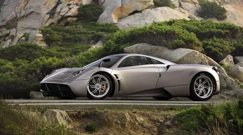 Silver Sports Car — Dramatic, Afternoon, Photograph, Rocky Hillside