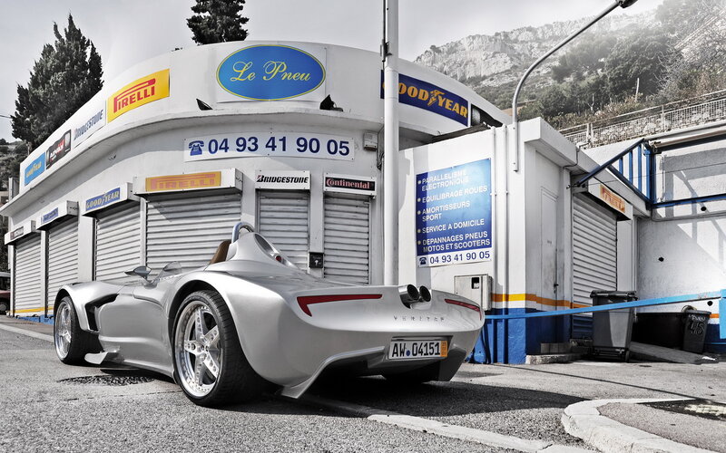 Silver Sports Car — Dramatic, Afternoon, Photograph, Tire Shop