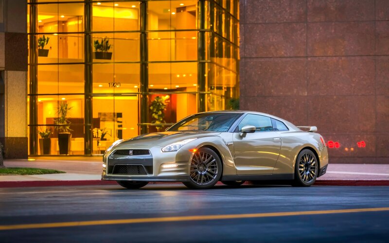 Silver Sports Car — Dramatic, Night, Photograph, Building, Glass Facade