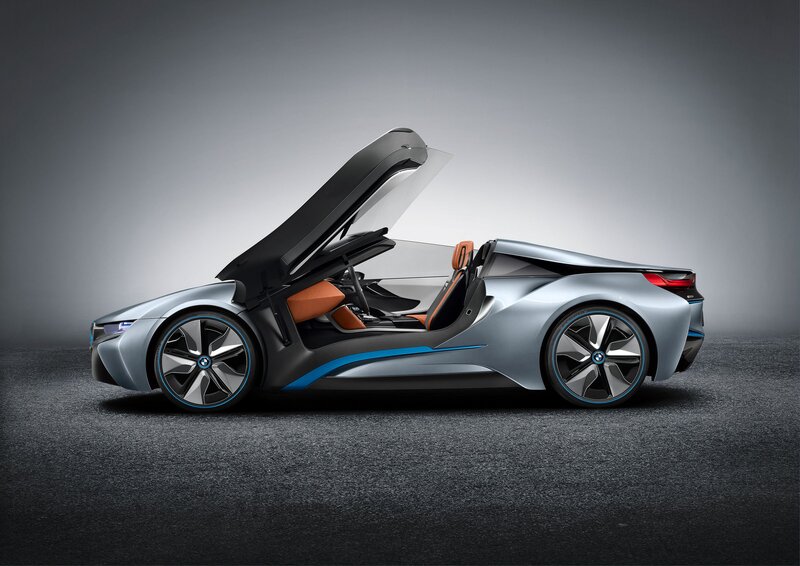 Silver Sports Car — Dramatic, Photograph, Car Door, Orange Seats