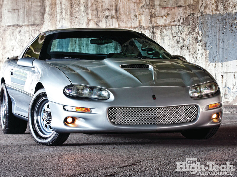 Silver Sports Car — Dramatic, Photograph, Concrete Wall