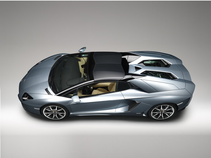 Silver Sports Car — Dramatic, Photograph, Interior, Wheels