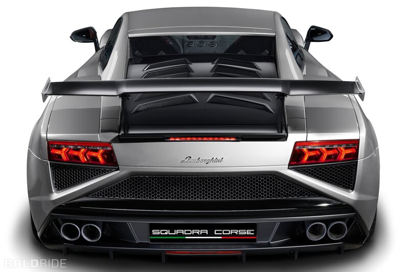 Silver Sports Car — Dramatic, Photograph, Rear Wing, Exhaust Pipes