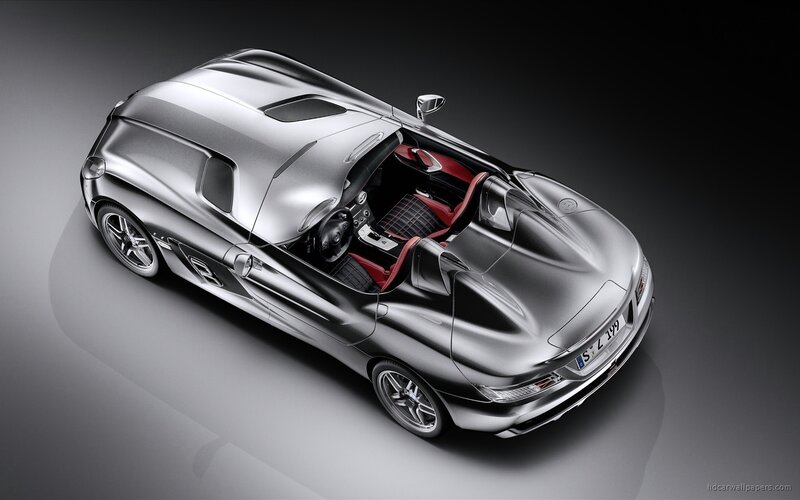 Silver Sports Car — Dramatic, Photograph, Red Seats, Open Roof