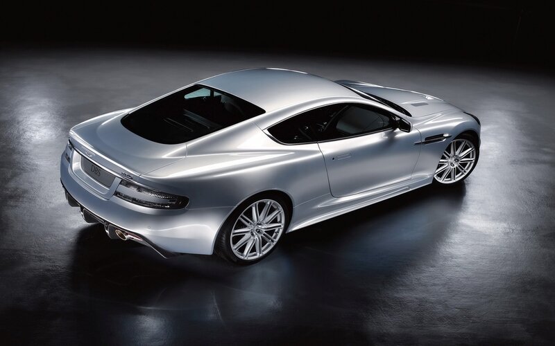Silver Sports Car — Dramatic, Photograph, Wheels, Exhaust