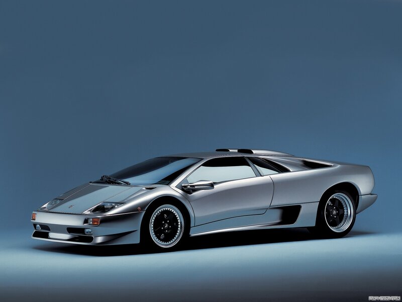 Silver Sports Car — Dramatic, Photograph, Wheels, Windows, Blue
