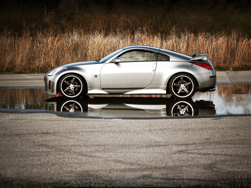 Silver Sports Car — Dramatic, Sunset, Photograph, Puddle