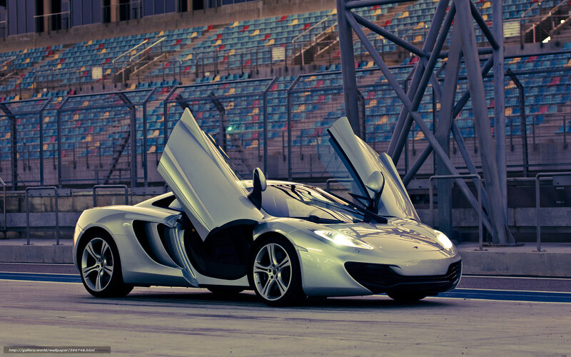 Silver Sports Car — Dramatic, Sunset, Photograph, Race Track, Stadium Seats