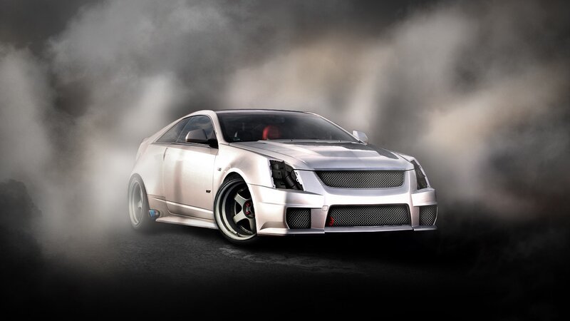 silver sports car drifting