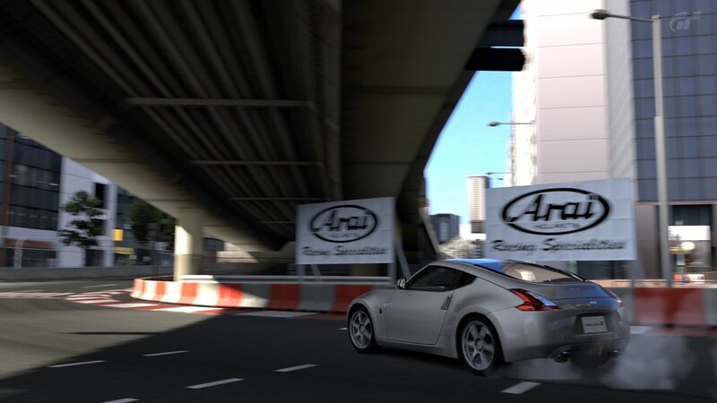 silver sports car drifting