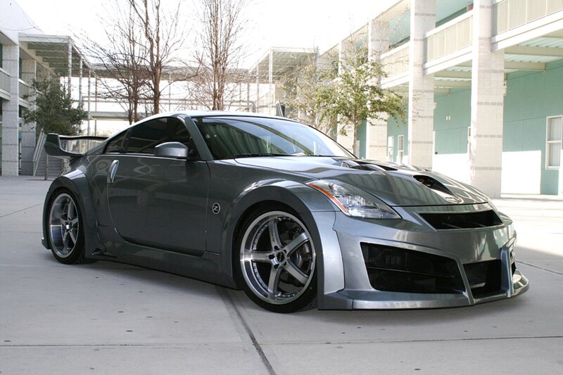 Silver Sports Car — Gray, Calm, Afternoon, Photograph, Building, Tree