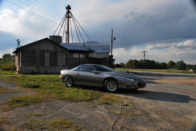 Silver Sports Car — Gray, Dramatic, Afternoon, Photograph, Barn