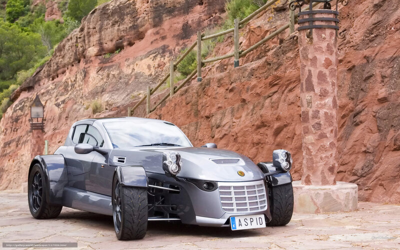 Silver Sports Car — Gray, Dramatic, Afternoon, Photograph, Rocky Cliff