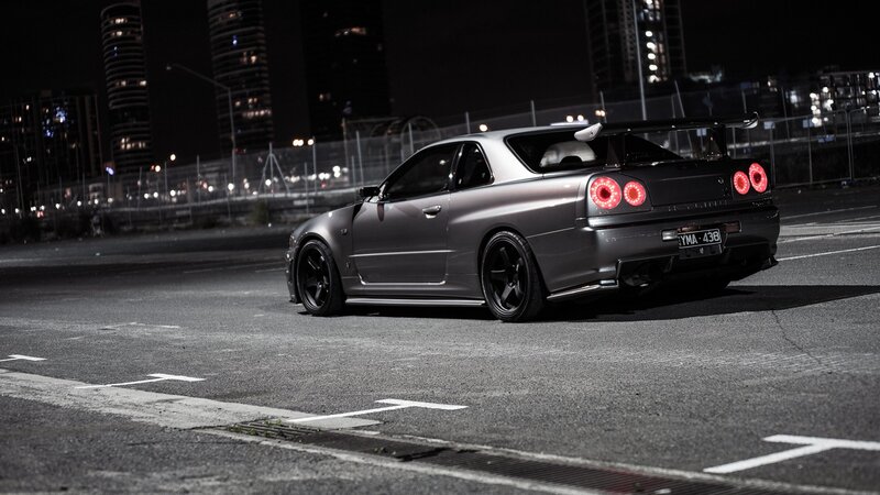 Silver Sports Car — Gray, Dramatic, Night, Photograph, City Skyline, Taillights, Tire, Black, Red