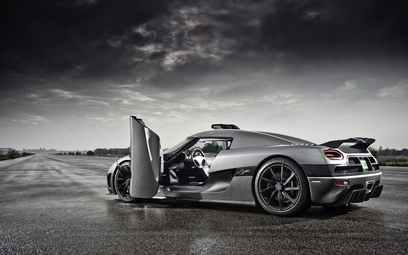 Silver Sports Car — Gray, Dramatic, Photograph, Open Door, Runway, Cloudy Sky, Black
